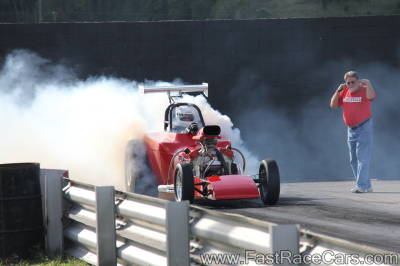 Red Altered Drag Car Doing Burnout Red Altered Drag Car Doing Burnout